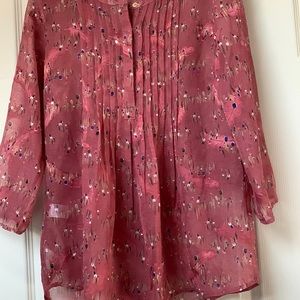 Pale sky blouse.Pleated details on the front.Hidden buttons.3/4 sleeve